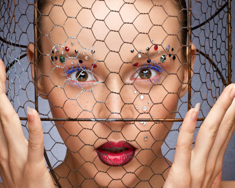 Woman with Face Jewelry — Red