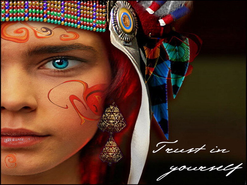 woman with face paint and headdress