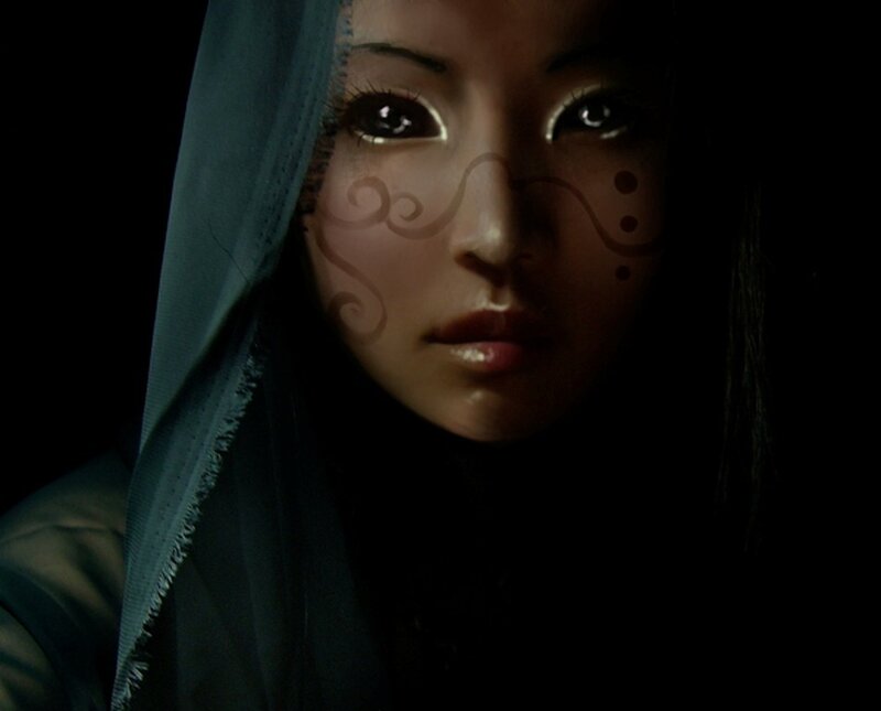 woman with face paint and hood