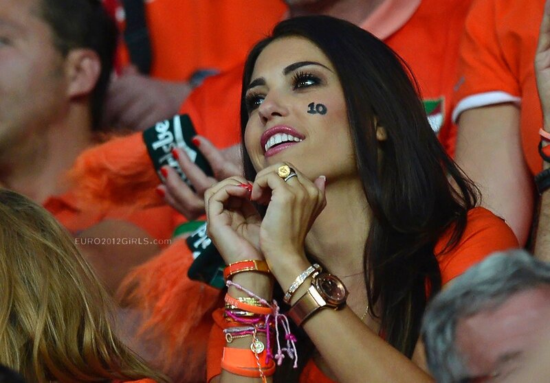 Woman with face paint at a match