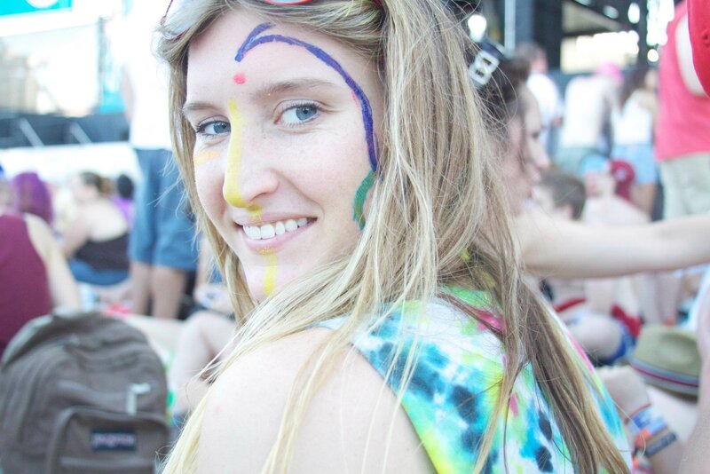 woman with face paint at festival