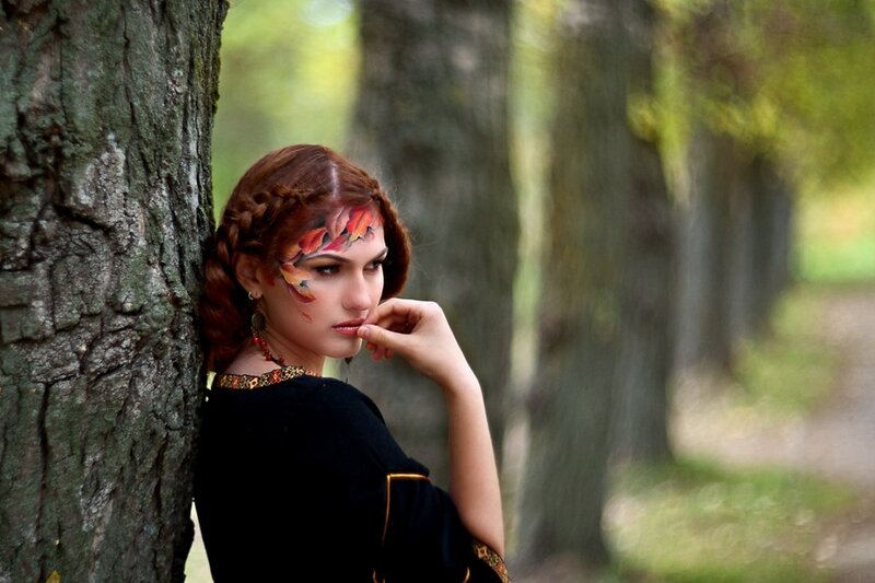 Woman with Face Paint — Black, Contemplative