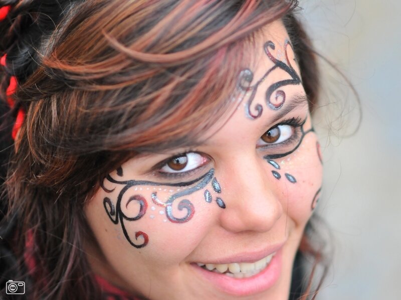 Woman with Face Paint — Brown, Happy