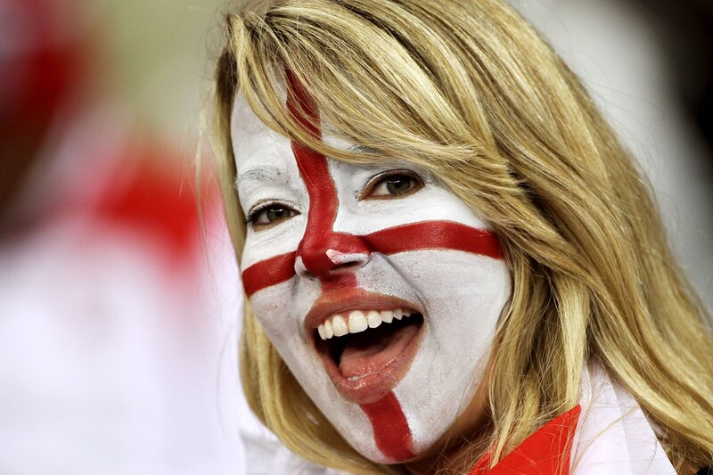 woman with face paint cheering