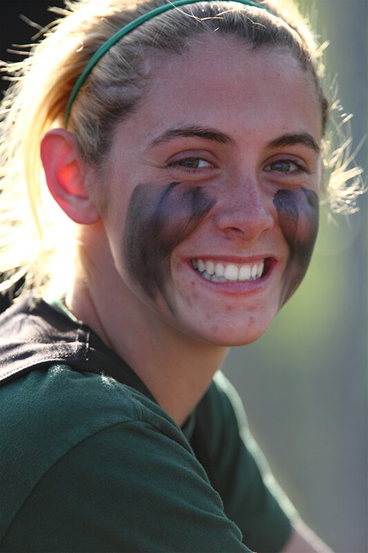 woman with face paint smiling