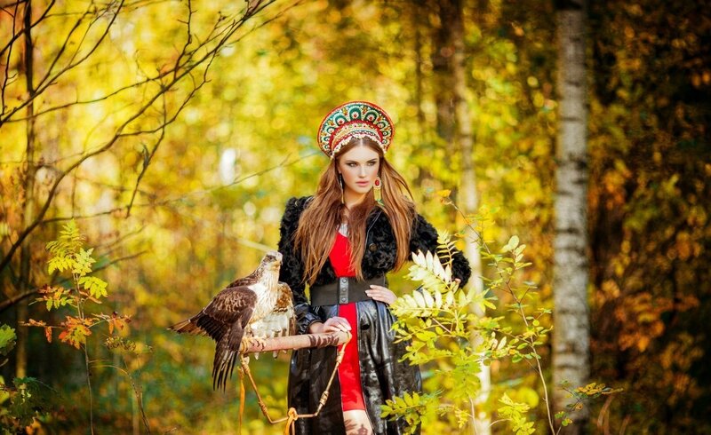 Woman with Falcon in Forest — Yellow