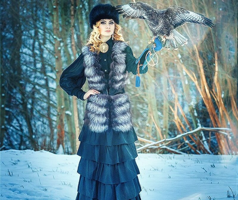 Woman with Falcon in Snow