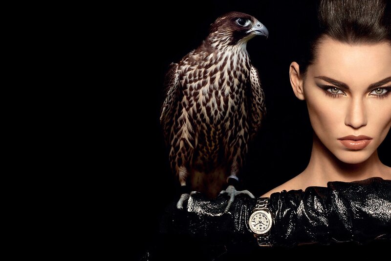 woman with falcon on arm