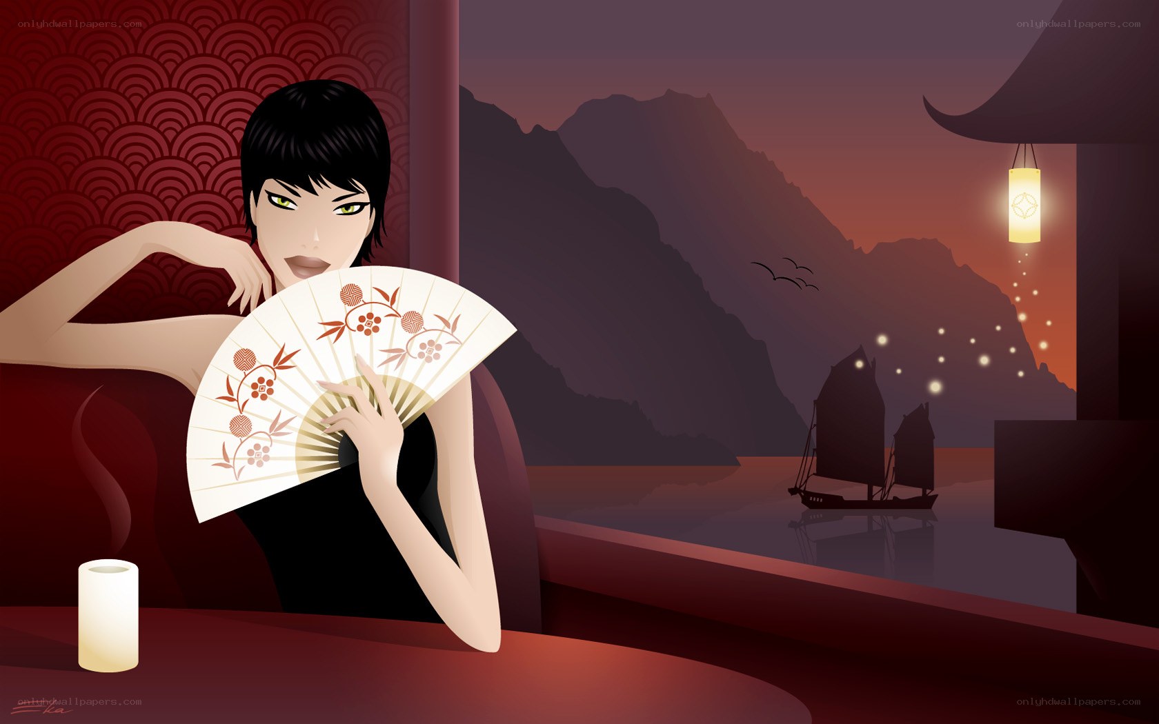 woman with fan at sunset