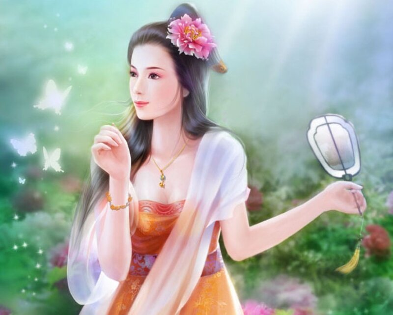 woman with fan in garden