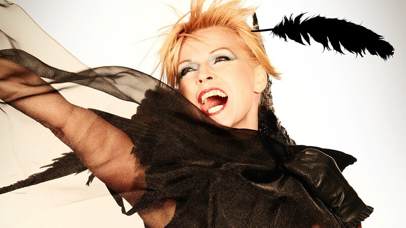 woman with feather and black scarf