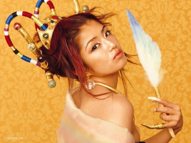 woman with feather and crown