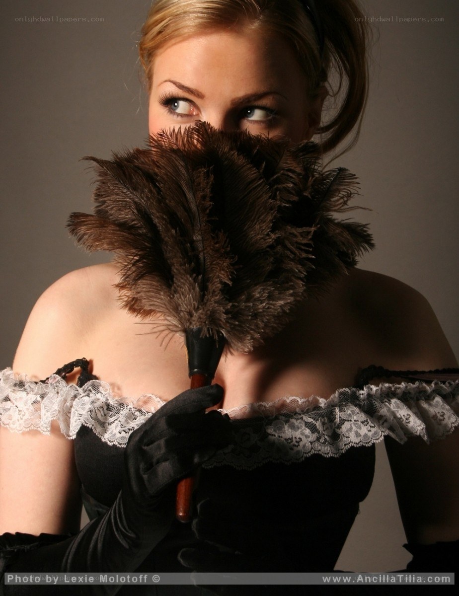 woman with feather duster