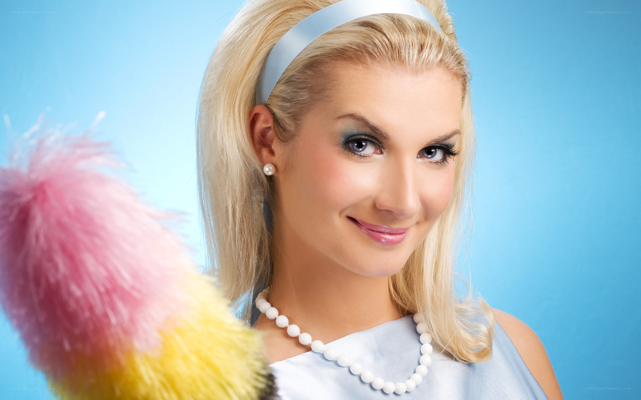 woman with feather duster