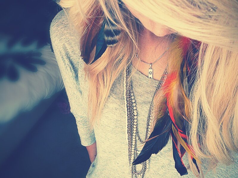 woman with feather hair accessories