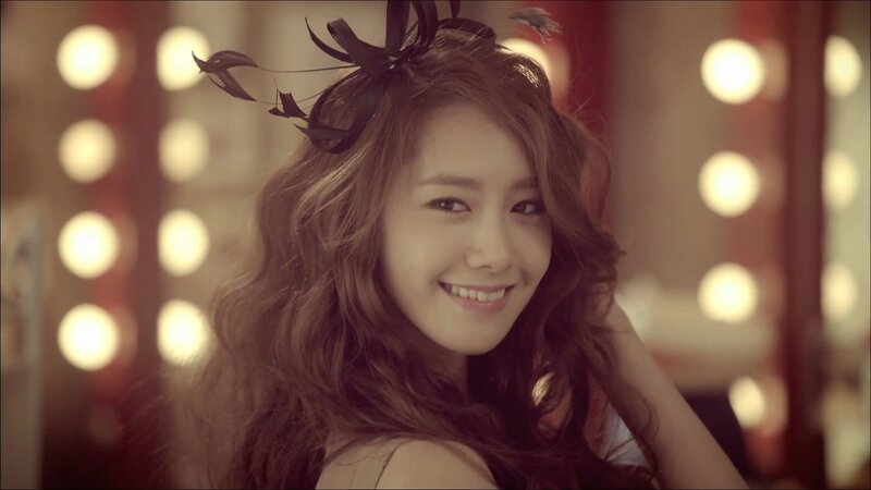 woman with feather hair accessory