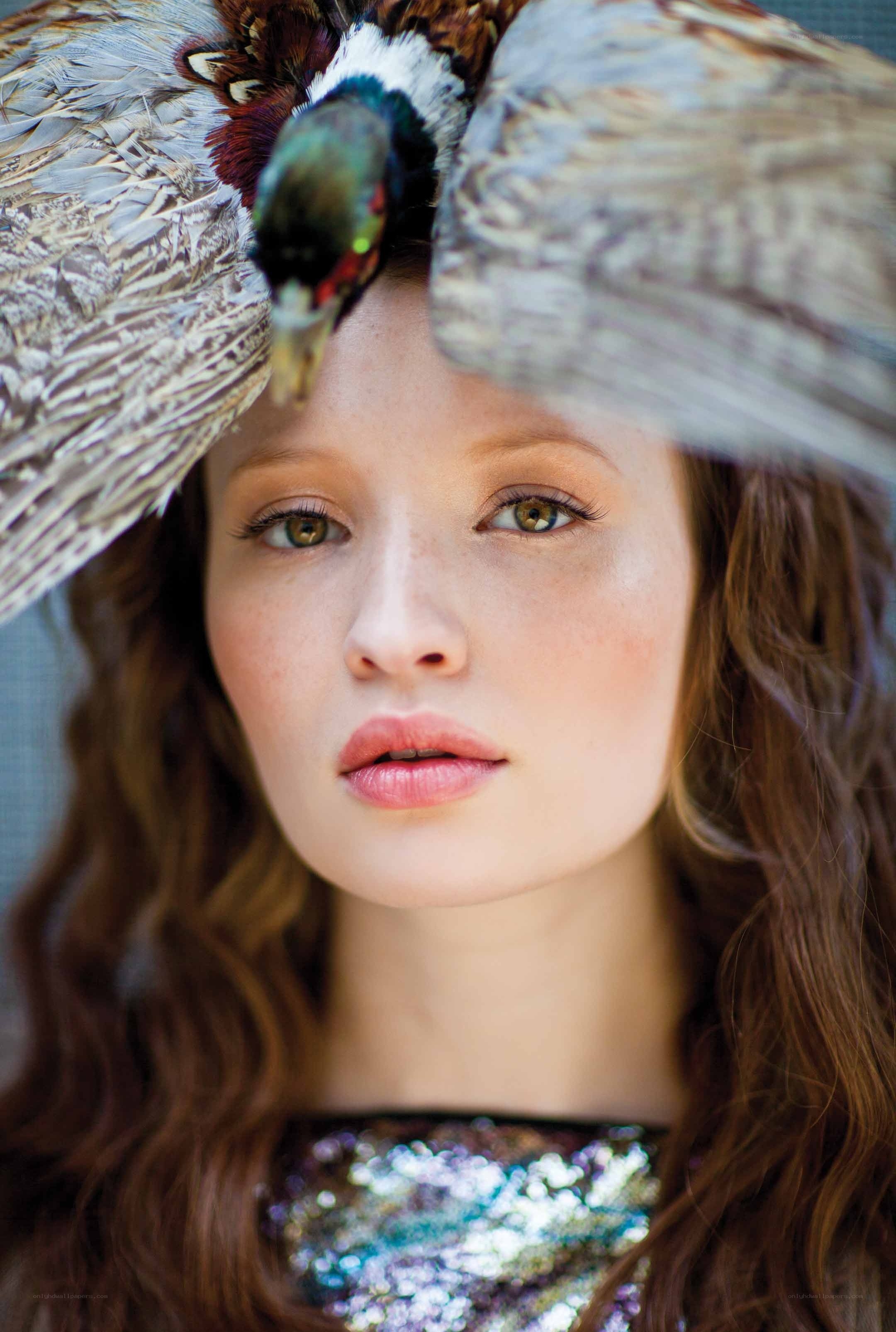 woman with feather hat