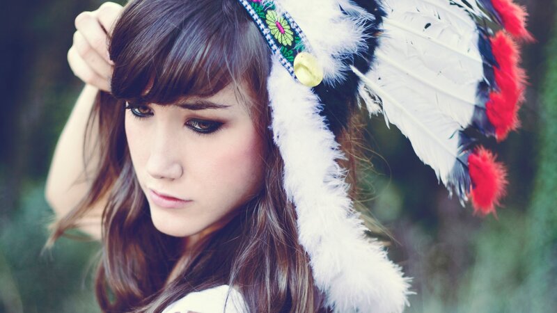 woman with feather headdress