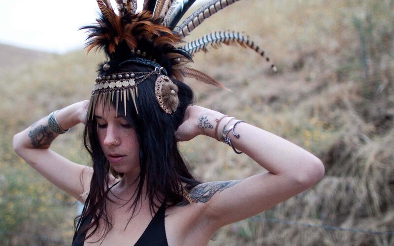 woman with feather headdress