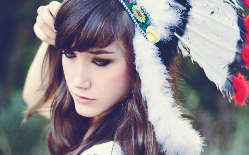woman with feather headdress