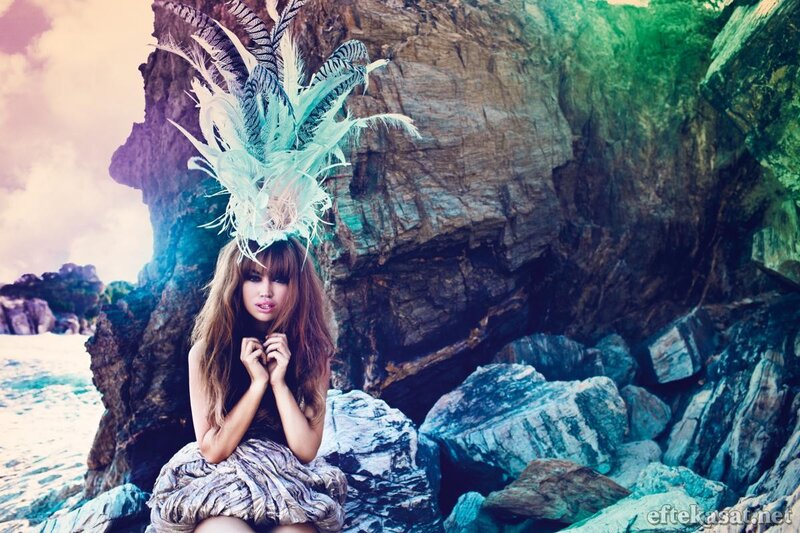 Woman with Feather Headdress — Blue, Dramatic, Afternoon