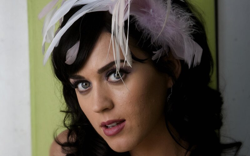woman with feather headpiece