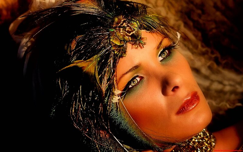 woman with feather headpiece