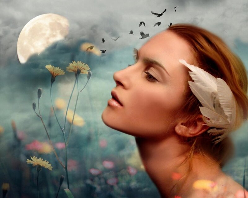 woman with feather in hair