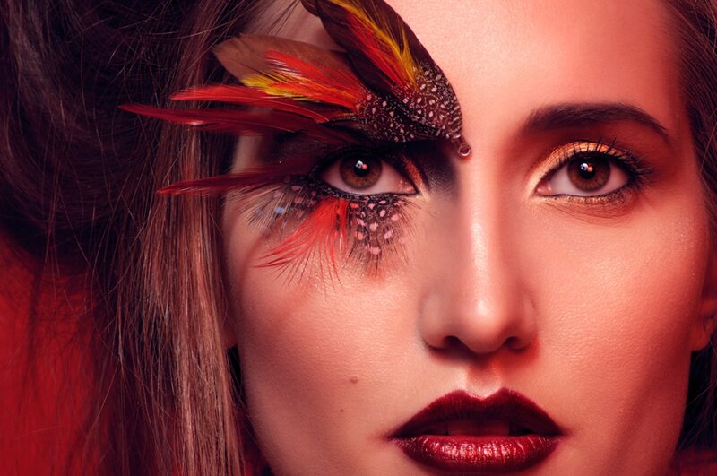 Woman with Feather Makeup — Red