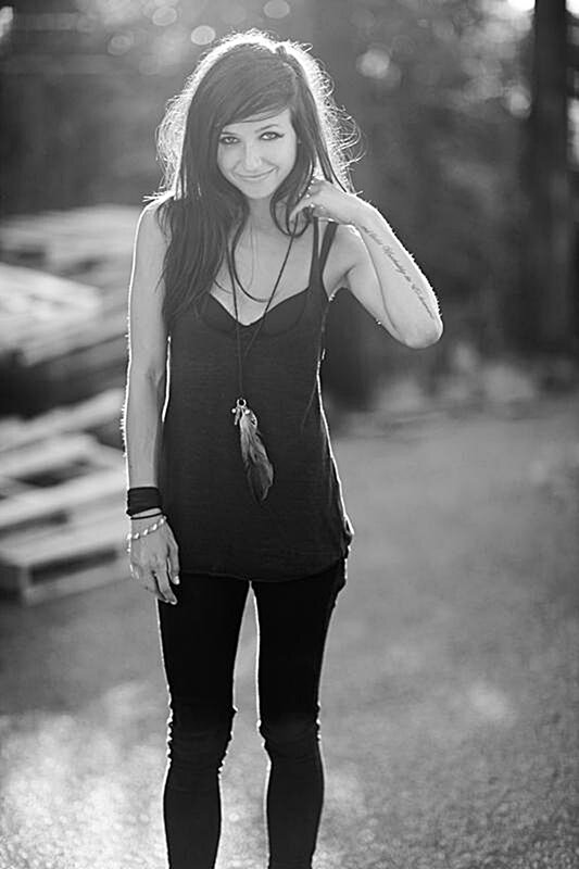 woman with feather necklace