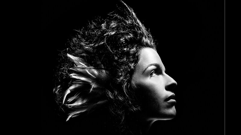 woman with feathered hair