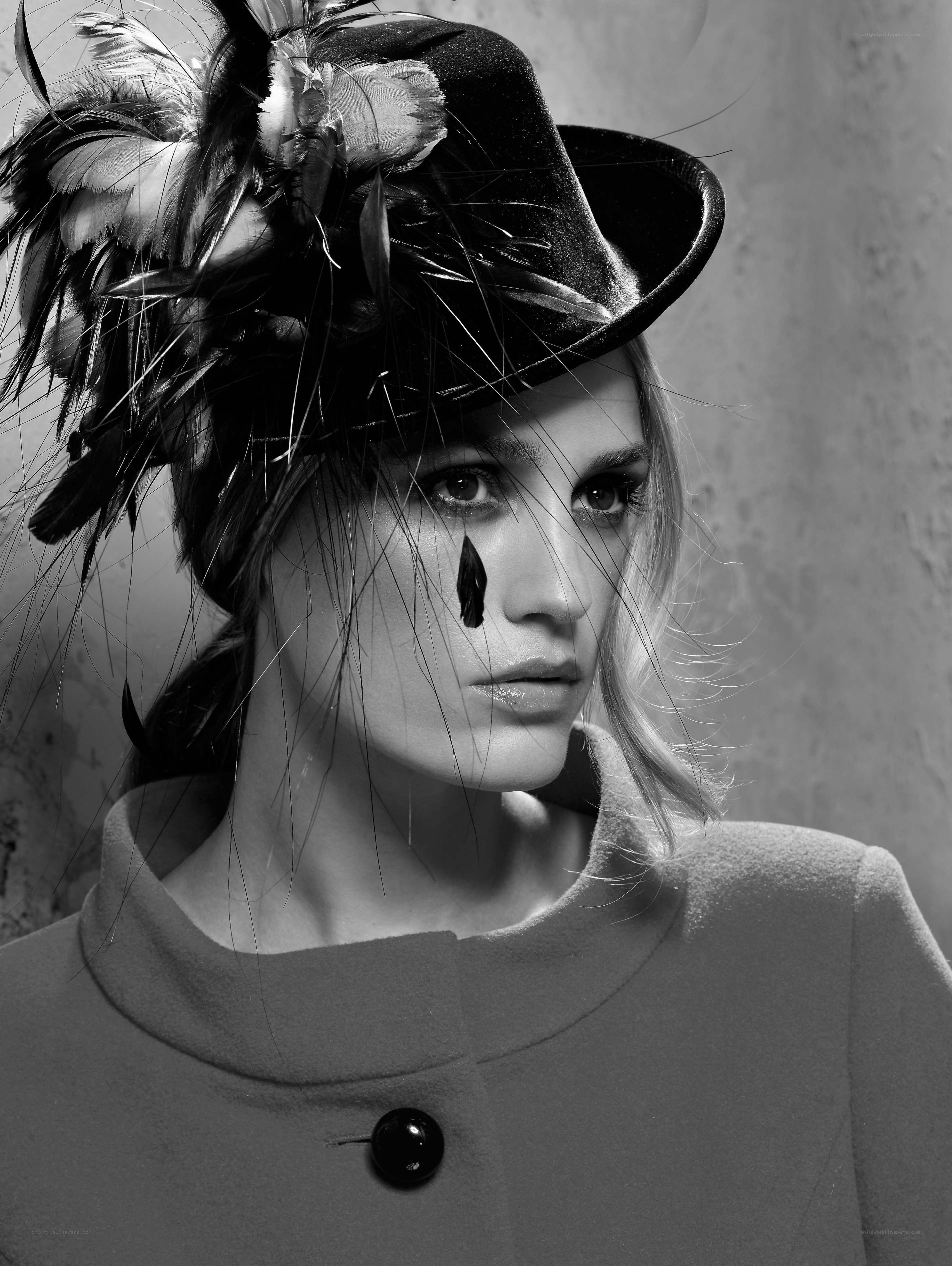 woman with feathered hat