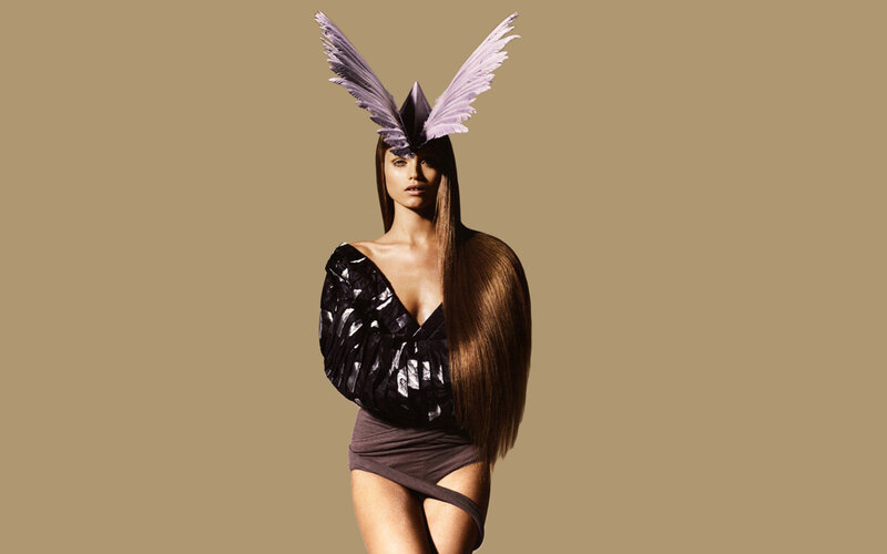 woman with feathered headpiece