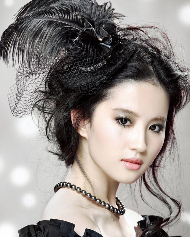 woman with feathered headpiece