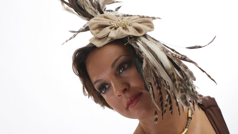 woman with feathered headpiece