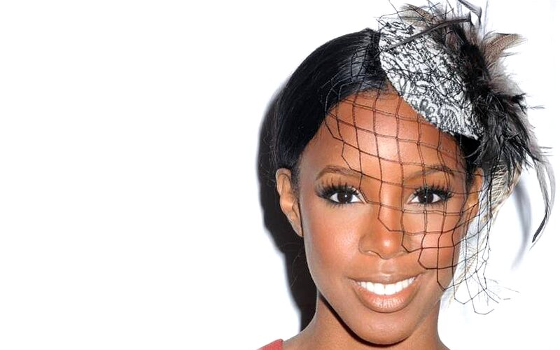 Woman with Feathered Headpiece — Black, Neutral