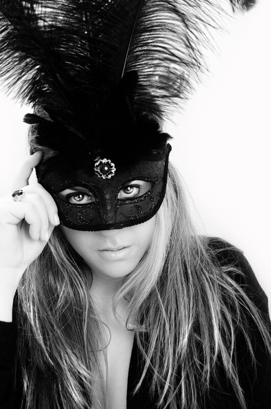 woman with feathered mask