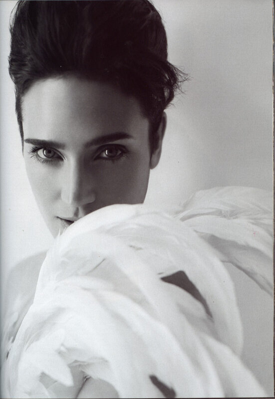 woman with feathers in black and white