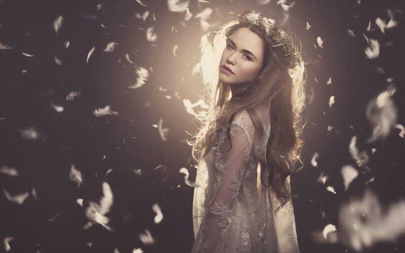 Woman with Feathers — White, Dramatic