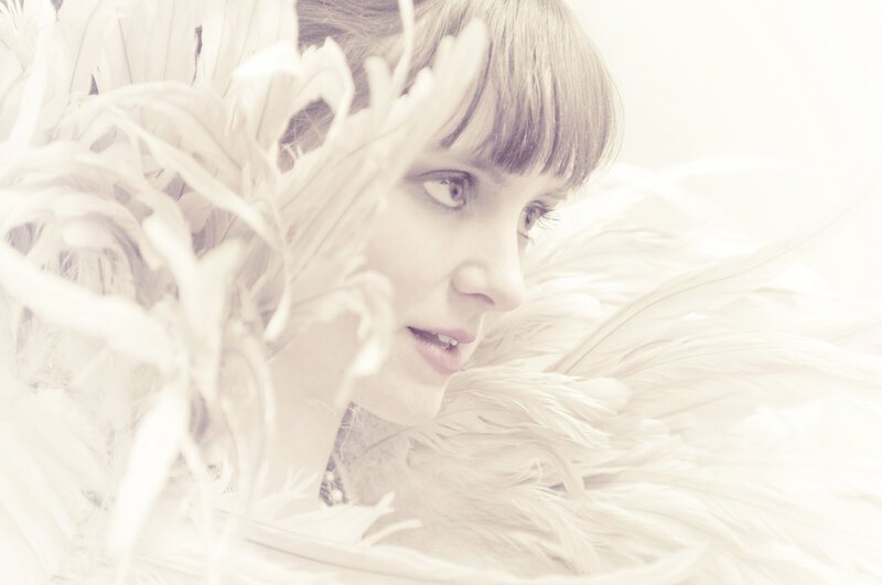 Woman with Feathers — White, Dreamy