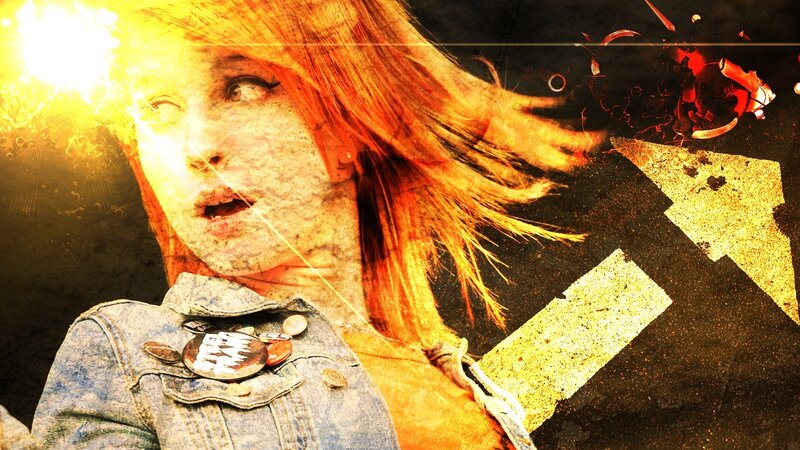 woman with fiery hair and denim jacket