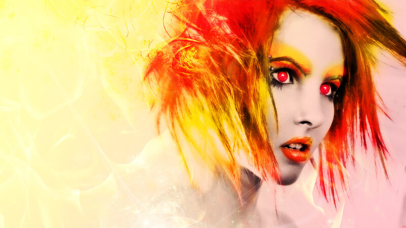 woman with fiery hair and red eyes