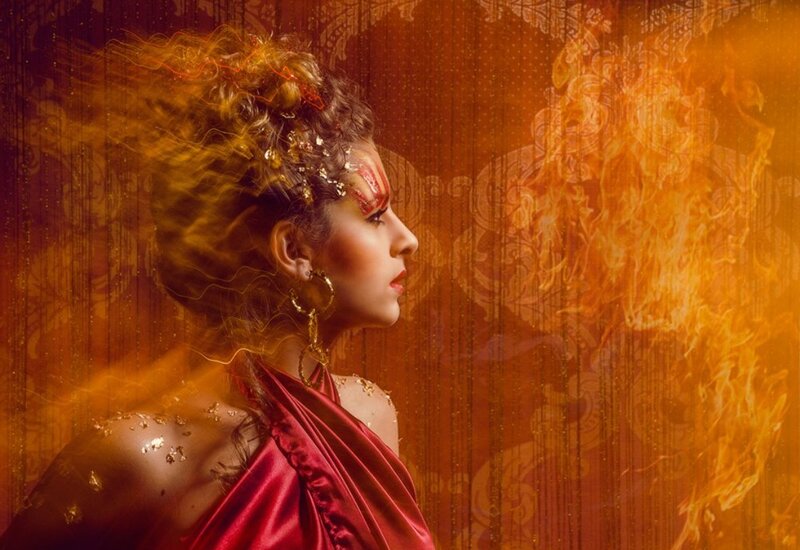 Woman with Fiery Makeup — Red