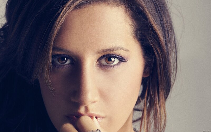 woman with finger on lips