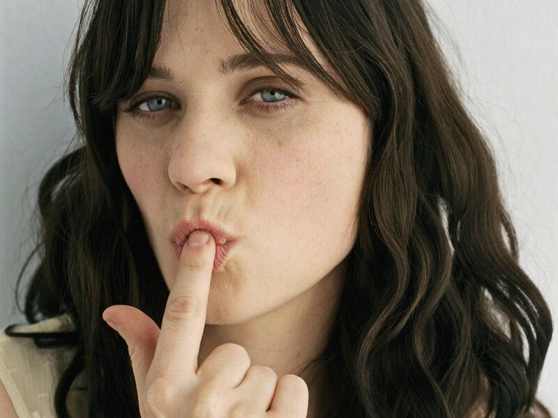Woman with Finger on Lips — Brown