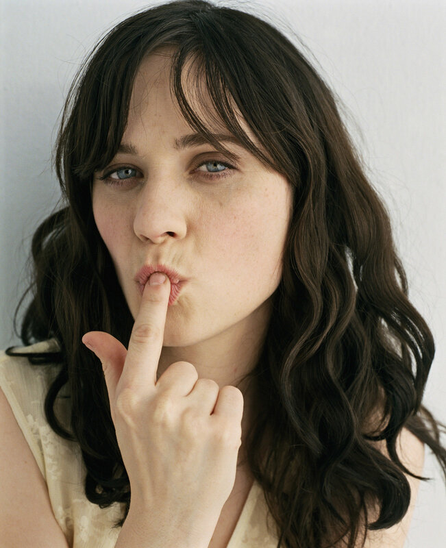 woman with finger to lips