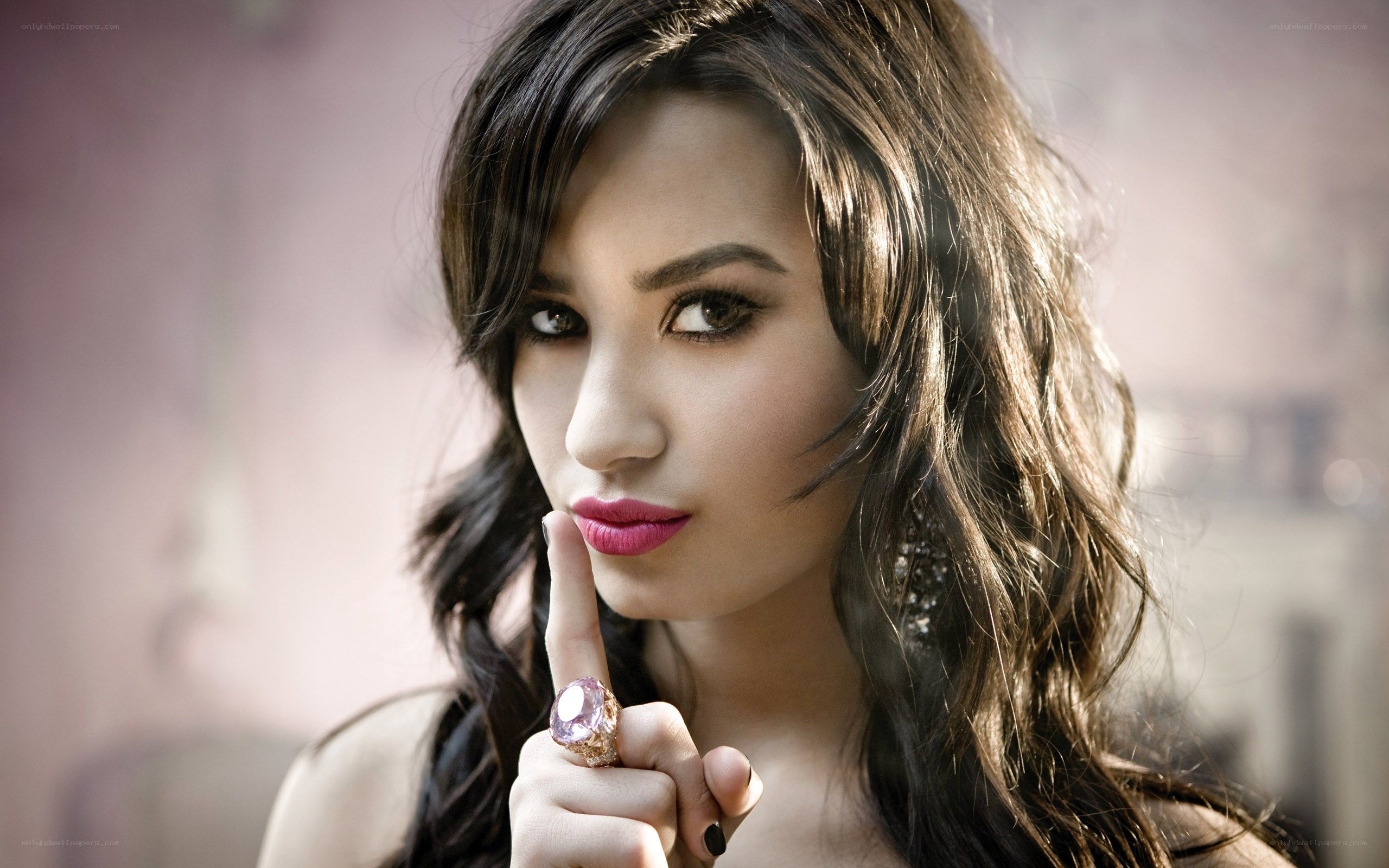 woman with finger to lips