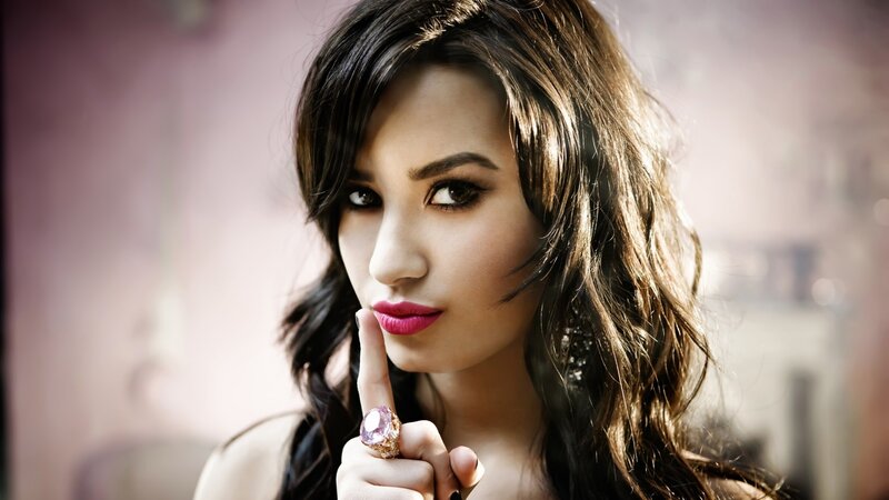 woman with finger to lips