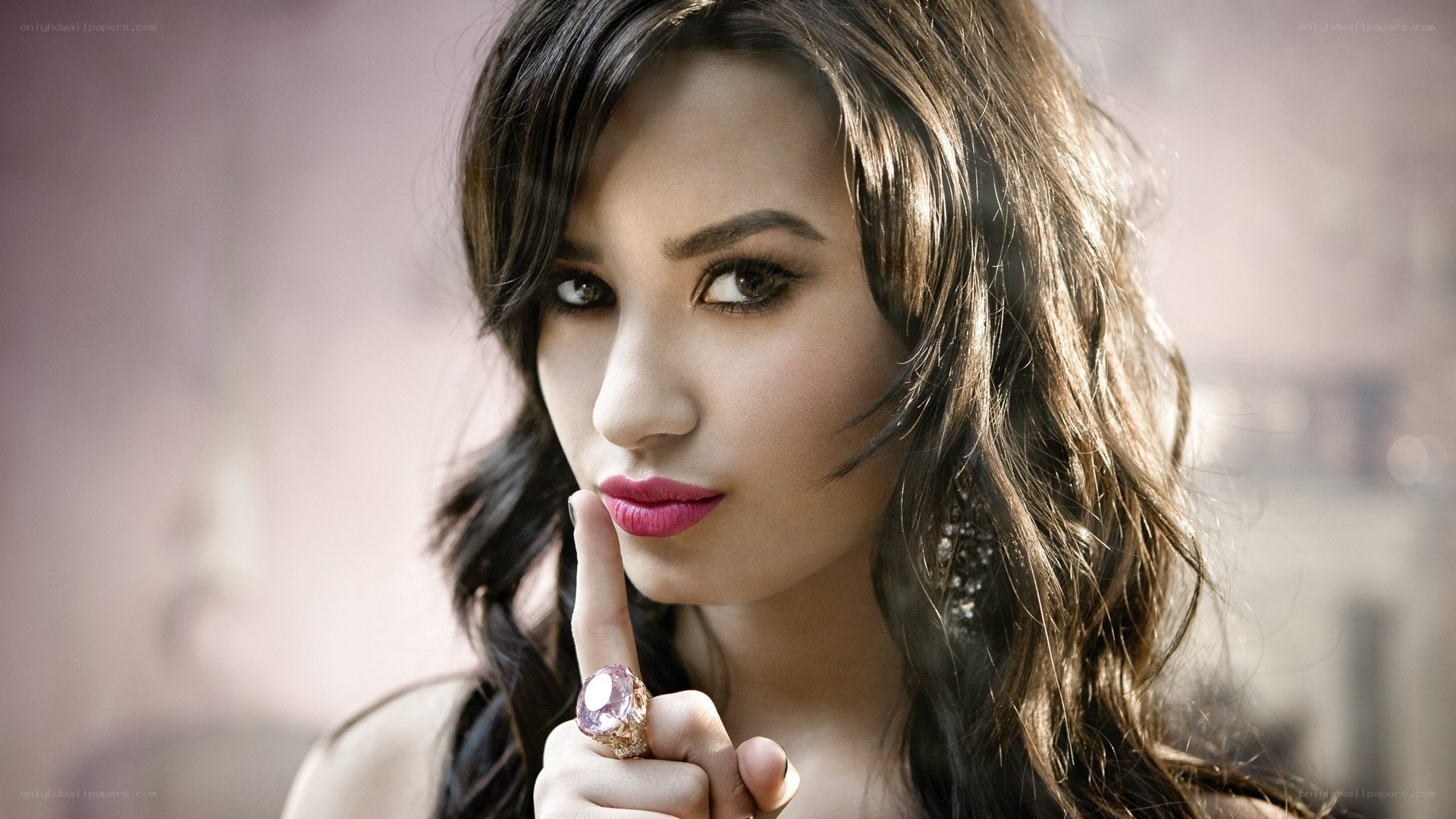 woman with finger to lips