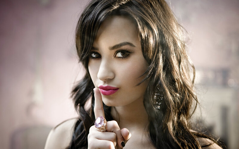 woman with finger to lips
